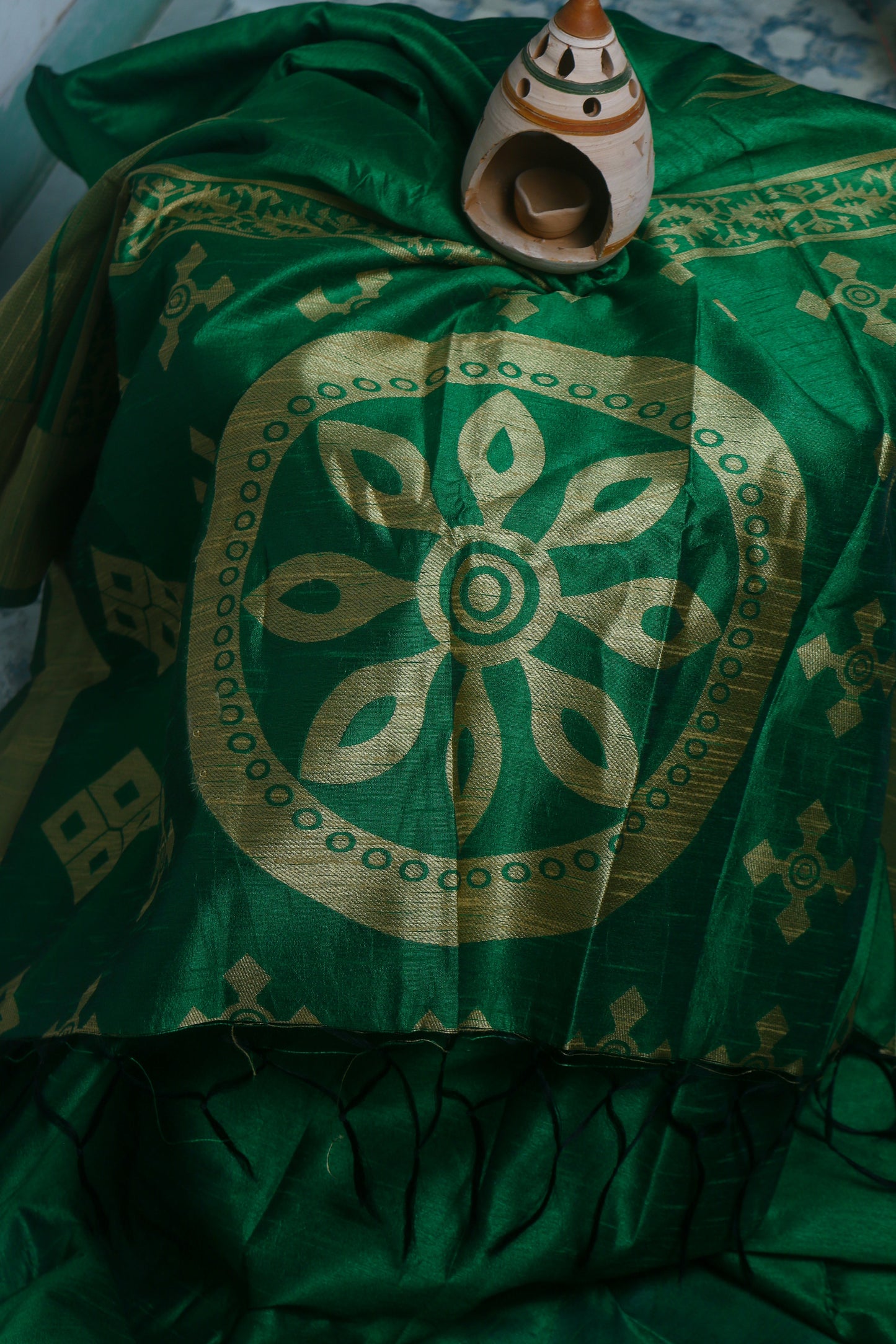 Green-Colored Saree with Golden Hues